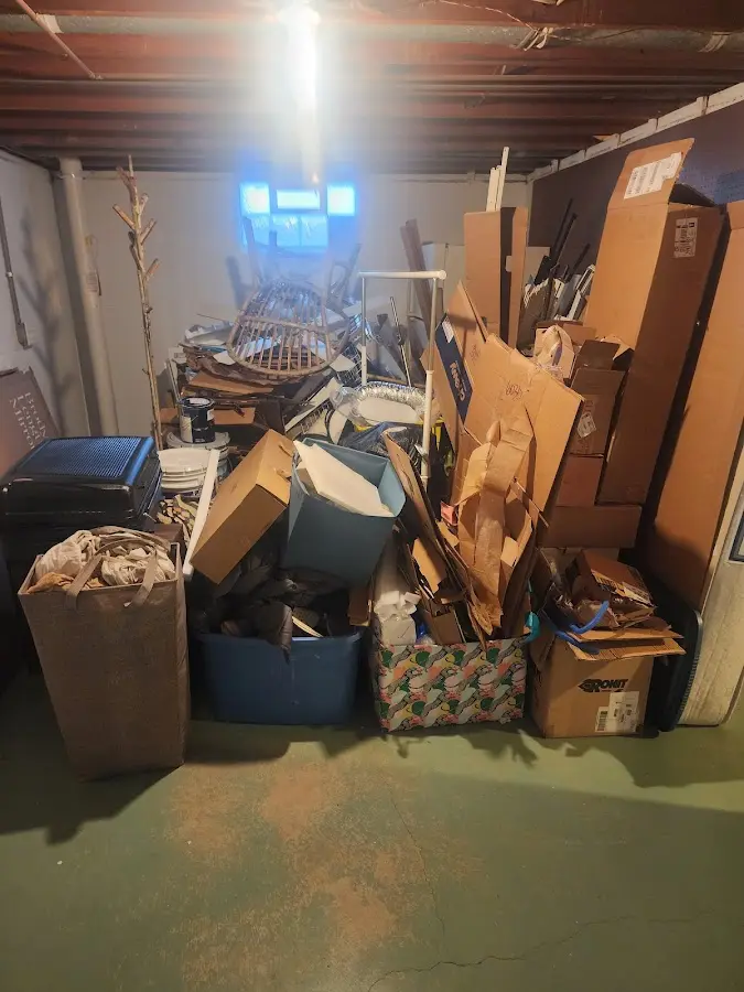 Roll-off dumpster container at job site for 20 Yard Dumpster Rental in Fayetteville